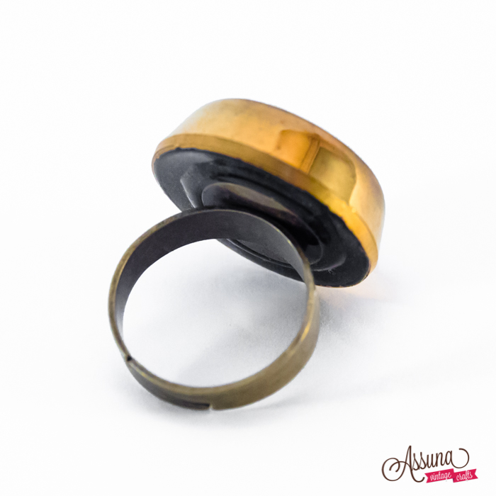 Golden and black Liliane ring